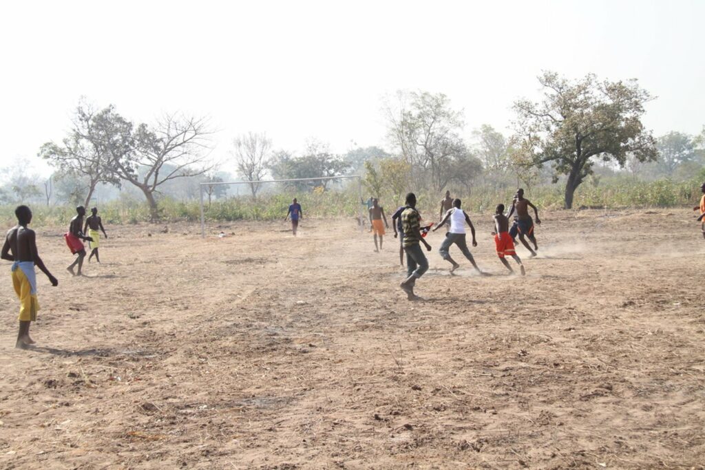 Group playing soccer
