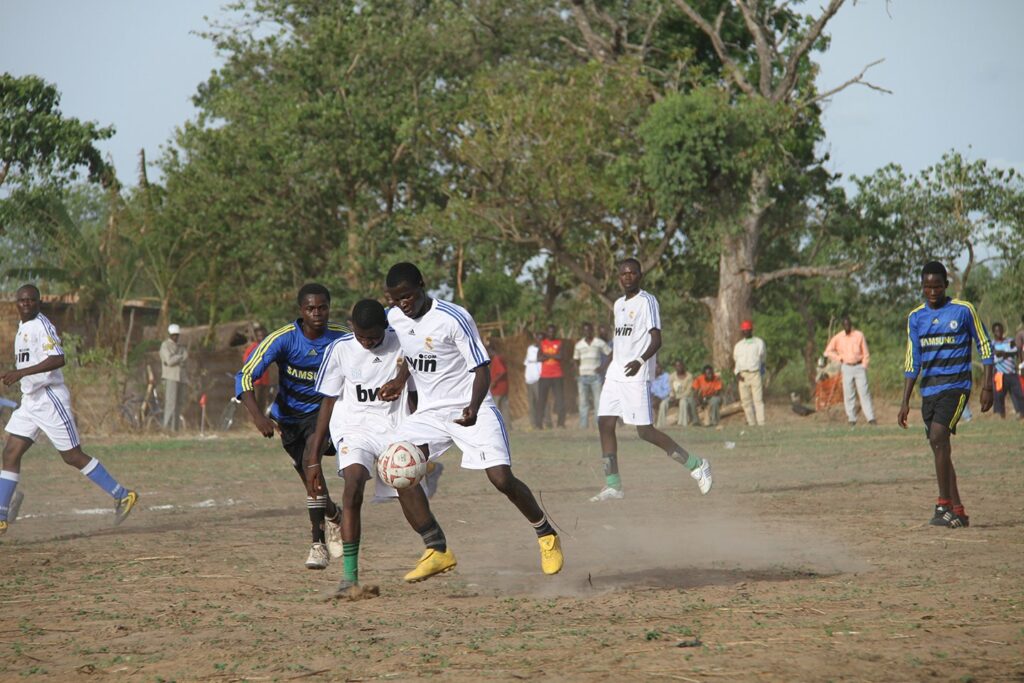 Players on football field