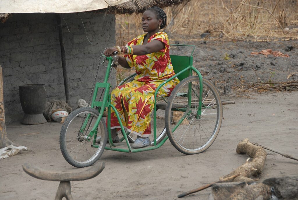 Woman riding tricycle