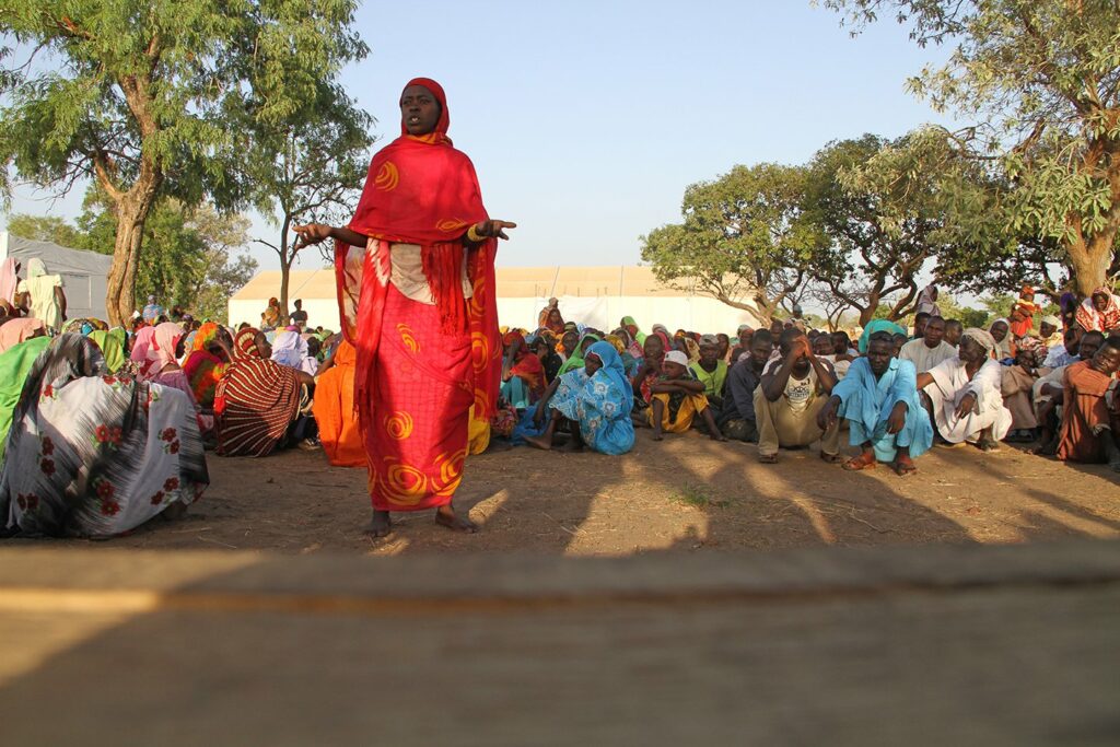 Woman speaking to crowd